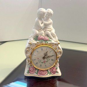 Hand Crafted Porcelain Figurine Clock 'The First Embrace'!